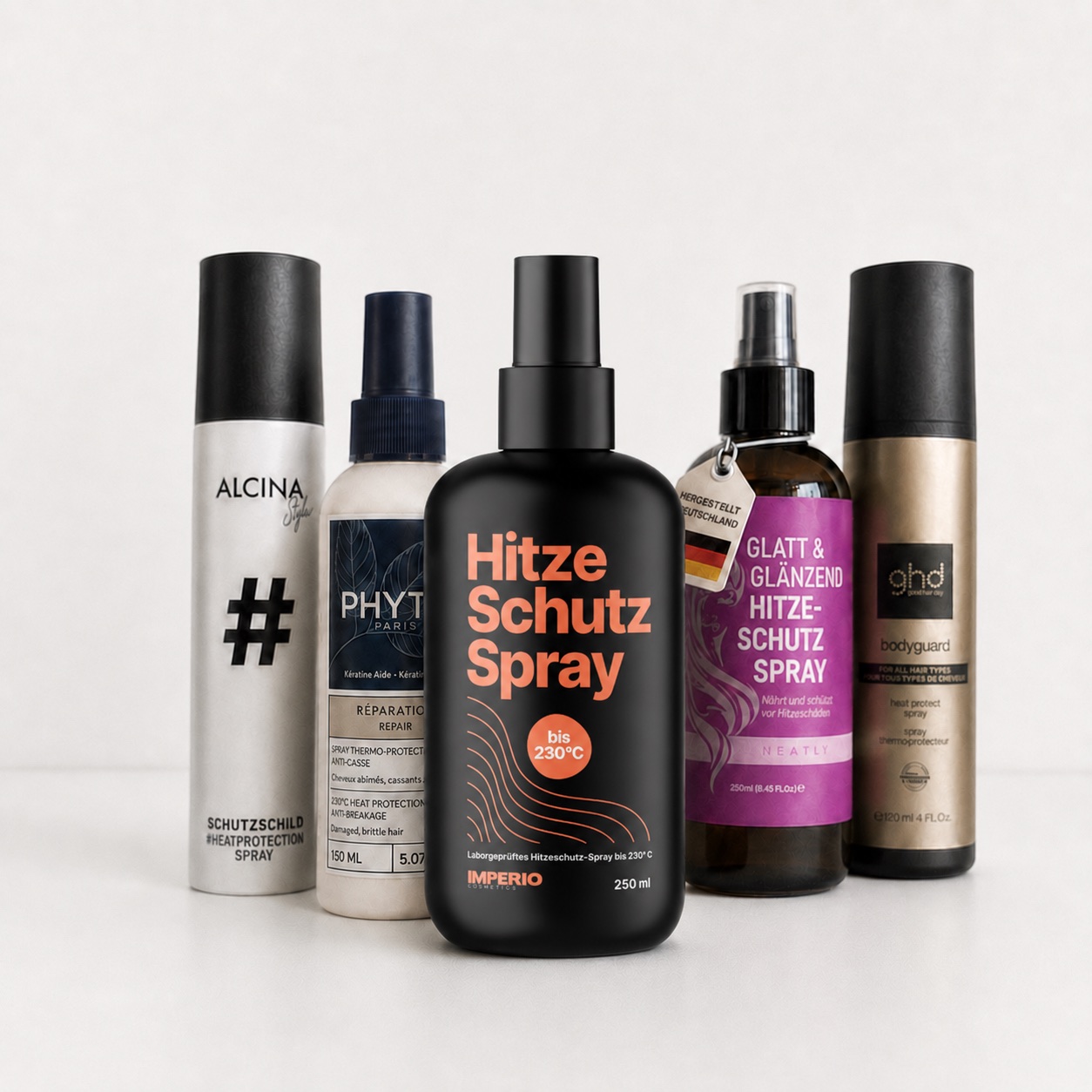 Alle fünf getesteten Hitzeschutzsprays im Vergleich, mit dem IMPERIO Hitzeschutzspray im Zentrum